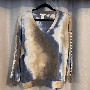 Ariella Long Sleeve shirt with ring like grommet sleeves